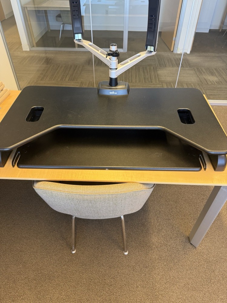 This is a VariDesk Cube Plus 40 standing desk converter in black