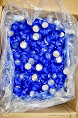 Aptar-38-400 Blue Flip Top Tab Caps with valve. Quantity 1200 per box