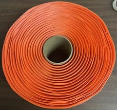 1 1/4” x 600′ x 3300# Orange Polyester Cord Woven Strapping