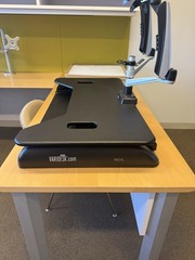 This is a VariDesk Cube Plus 40 standing desk converter in black